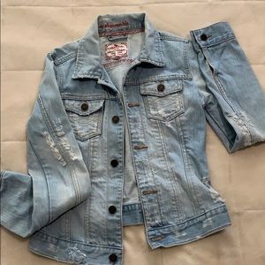 Distressed denim jacket